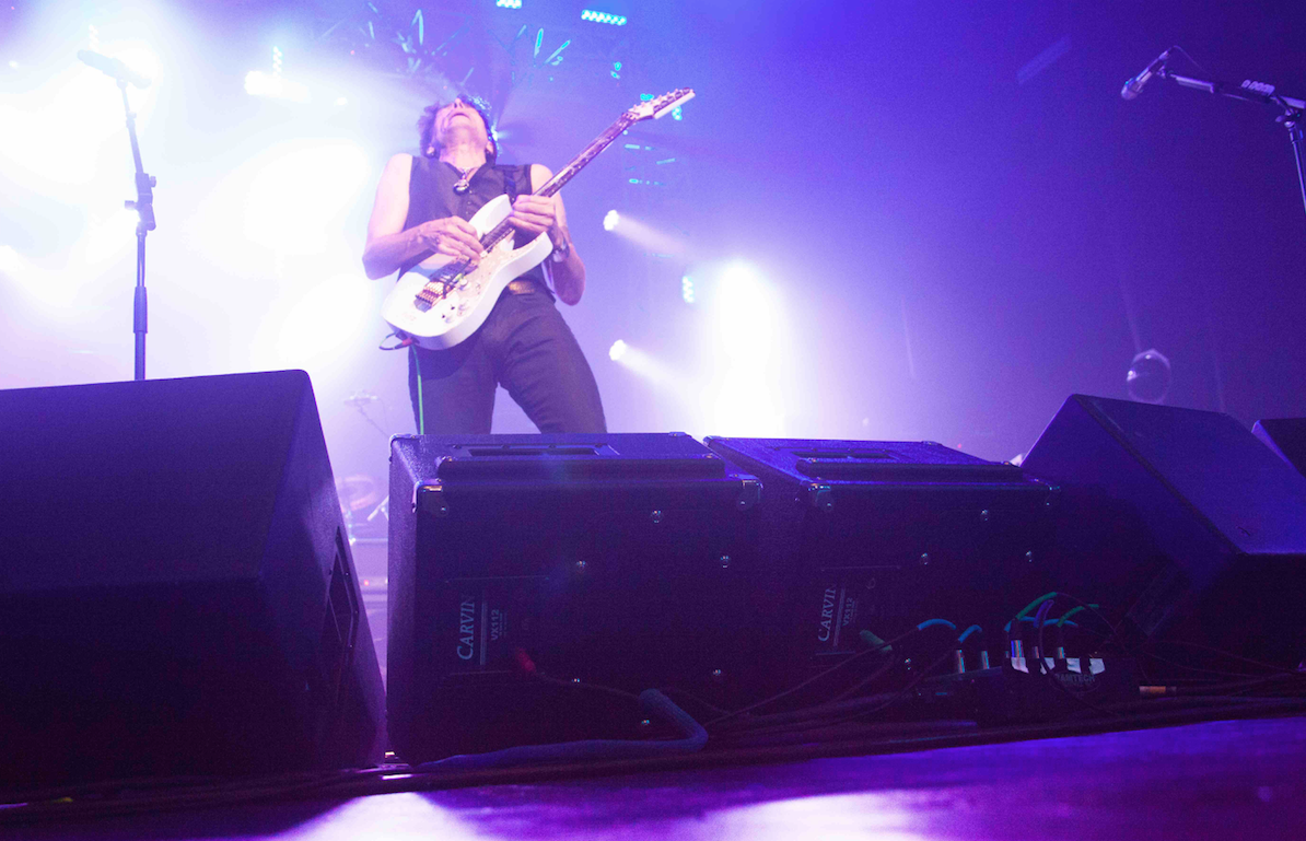 Steve Vai on Stage with Guitar Amps